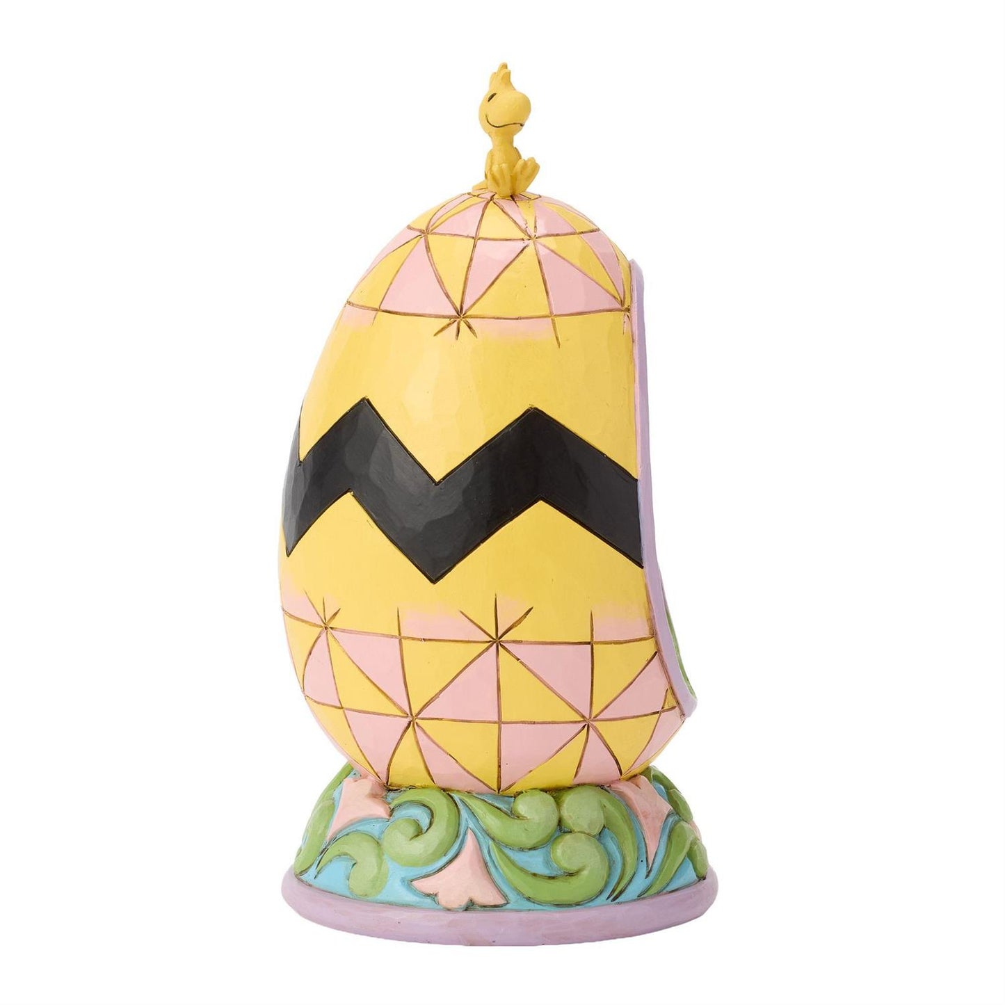 Charlie Brown and Snoopy look for Easter Eggs inside an Easter Egg while Woodstock sits on top