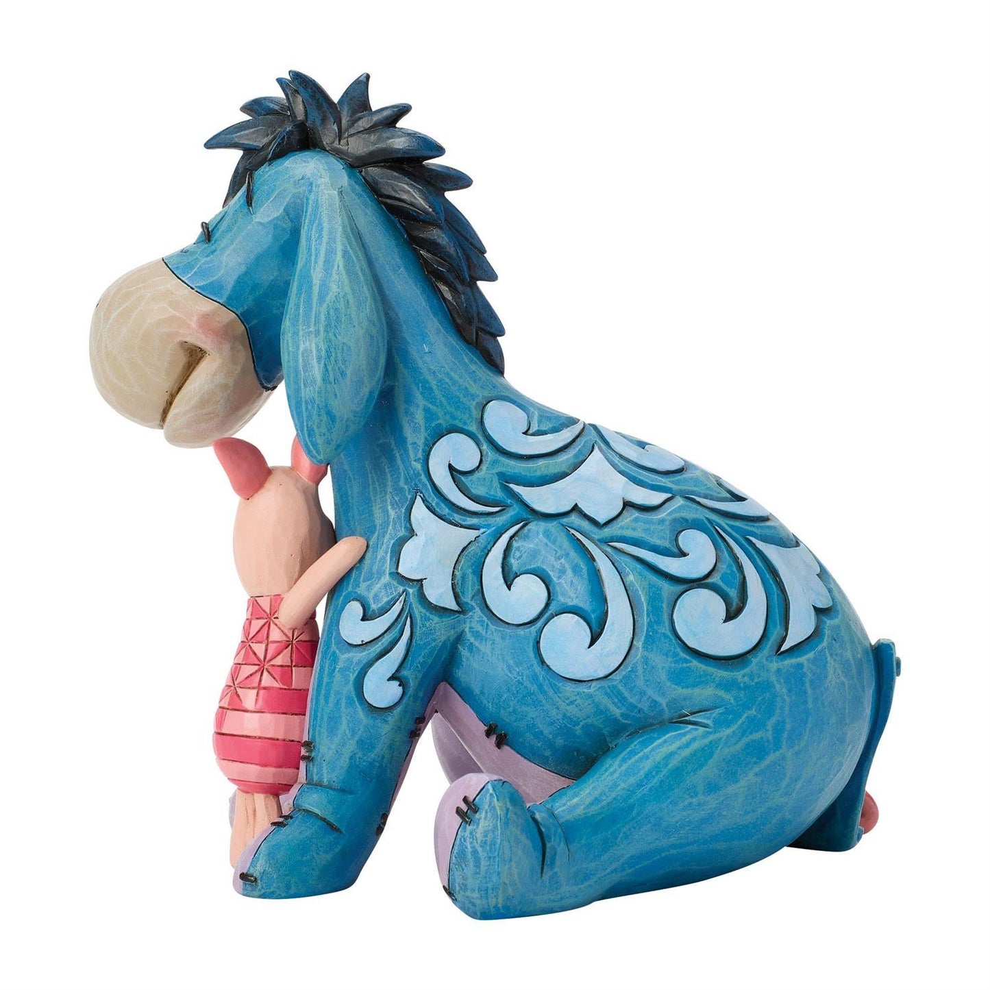 Piglet giving Eeyore a hug