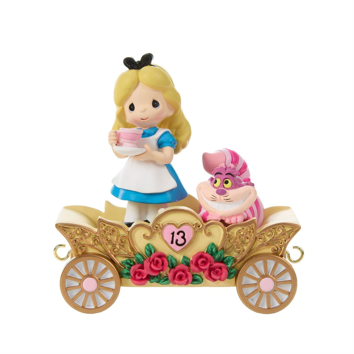 Alice holding a Tea Cup and the Cheshire Cat riding in a Birthday Train Car