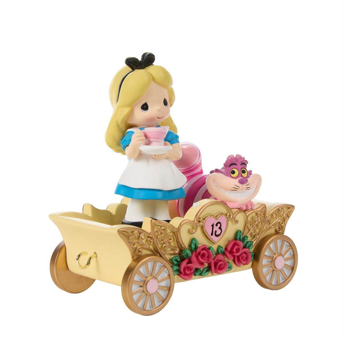 Alice holding a Tea Cup and the Cheshire Cat riding in a Birthday Train Car