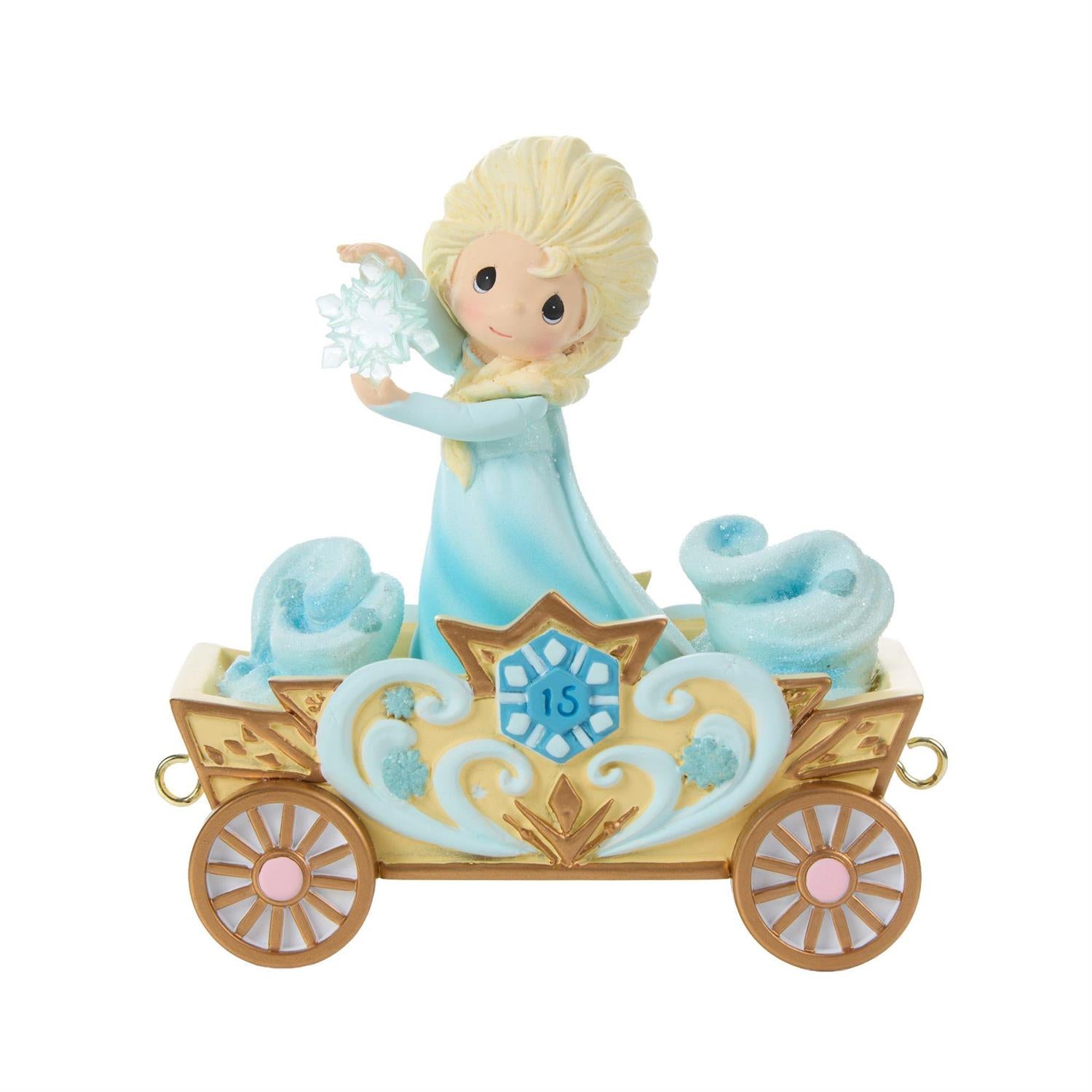 Princess Elsa holding a Snowflake on the Birthday Train