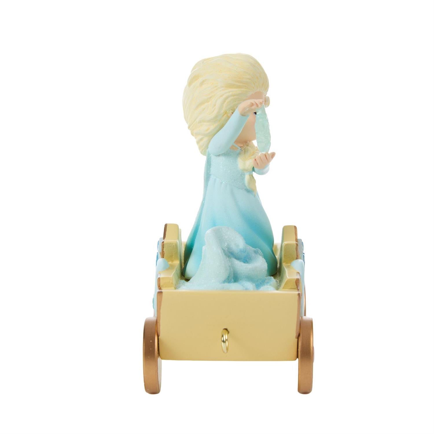 Princess Elsa holding a Snowflake on the Birthday Train