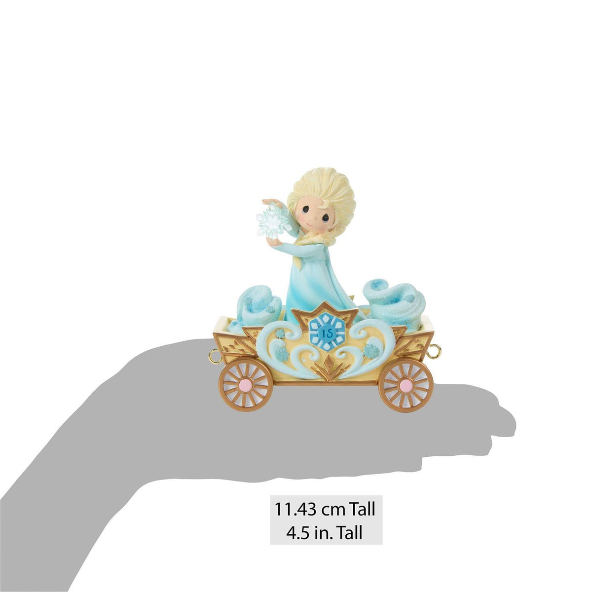 Princess Elsa holding a Snowflake on the Birthday Train