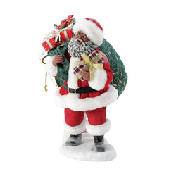 Buy Possible Dreams at CountryNMoreGifts.com Santa carrying his full Toy bag with his happy helper