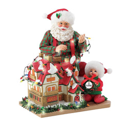 Buy Possible Dreams at CountryNMoreGifts.com Santa and his helper decorating a house with lights