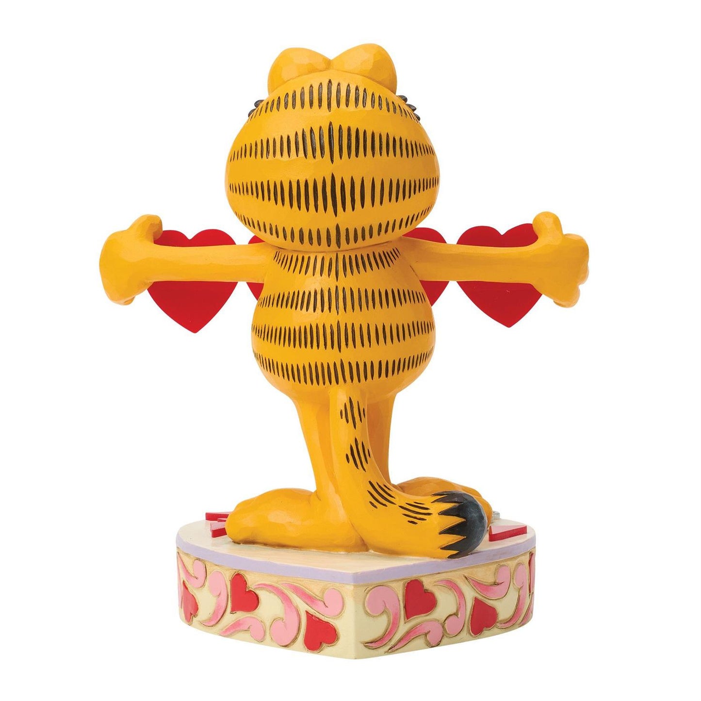 Garfield standing on a heart podium holding a string of hearts