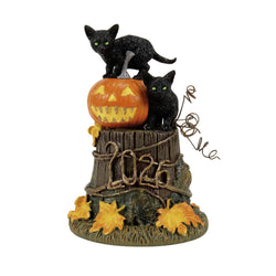 Buy Department 56 black cats sitting on a pumpkin on top of a dead stump with the roots reading 2026 from CountryNMoreGifts.com