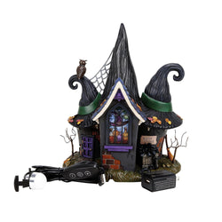 Buy Department 56 Halloween-themed miniature house with witch hats and an owl from CountryNMoreGifts.com