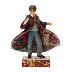 Buy Jim Shore at CountryNMoreGifts.com Harry Potter in his Hogwarts Robe with his Wand