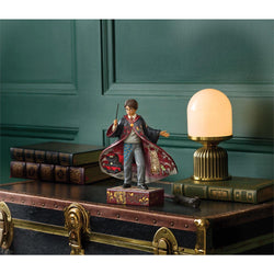 Buy Jim Shore at CountryNMoreGifts.com Harry Potter in his Hogwarts Robe with his Wand