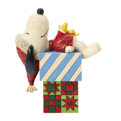 Buy Jim Shore at CountryNMoreGifts.com Snoopy and Woodstock laying on a Stack of Presents