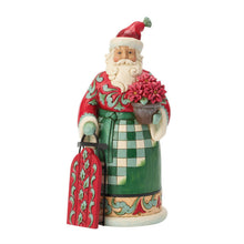 Sliding Into the Holidays - Highland Glen Santa Sled Figurine