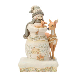 Buy Jim Shore at CountryNMoreGifts.com Snowman holding baby deer as the mom looks on