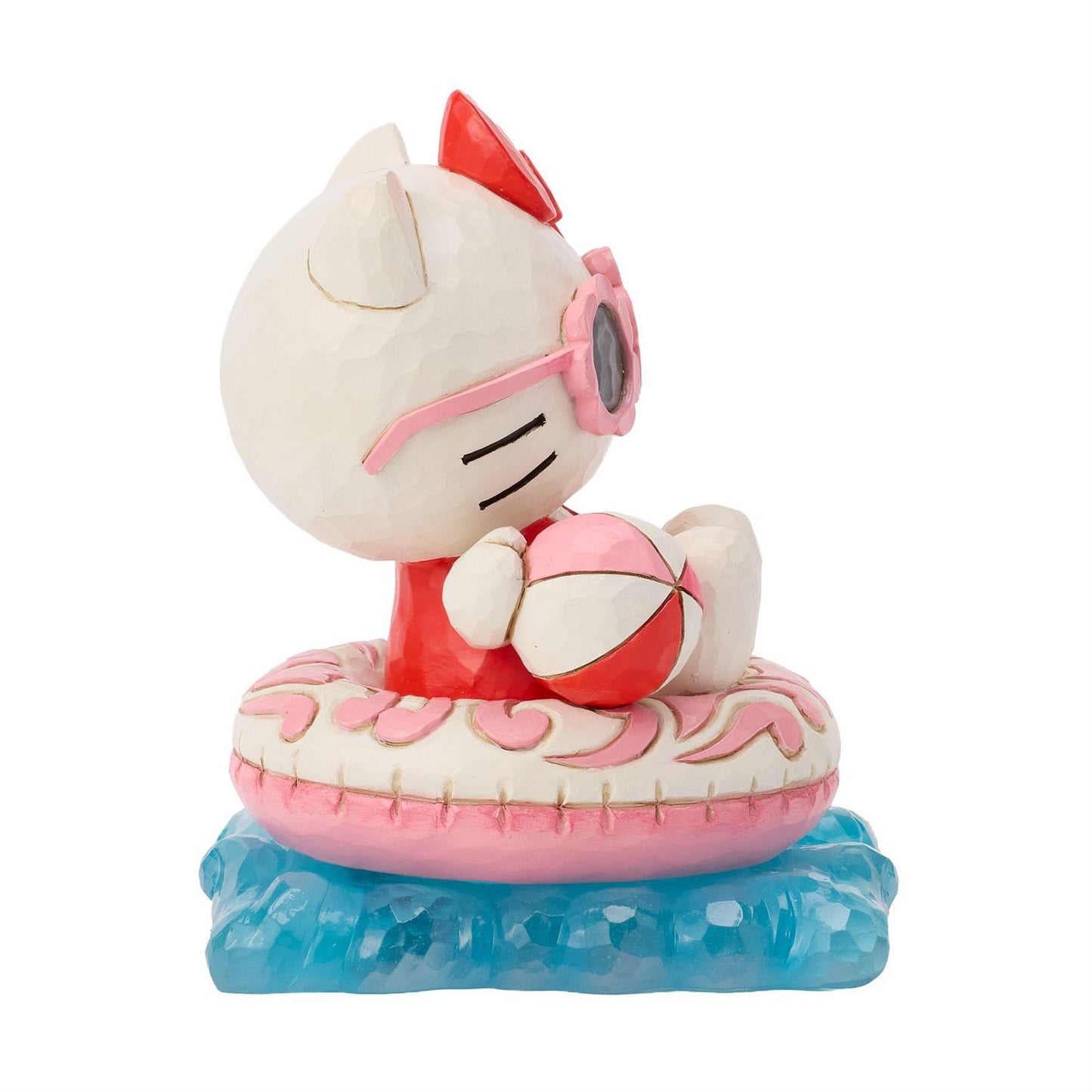Hello Kitty wearing her shades, relaxing in her Floatie and holding a beach ball