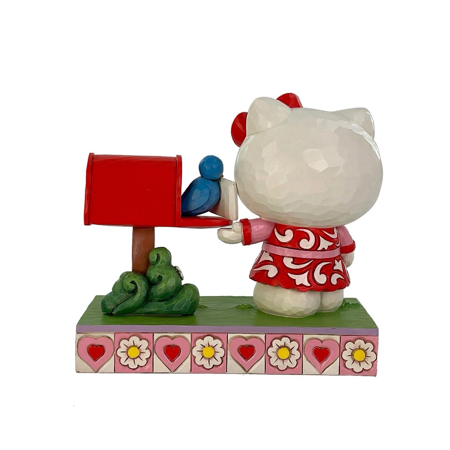 Hello Kitty checking her mailbox for a Valentine