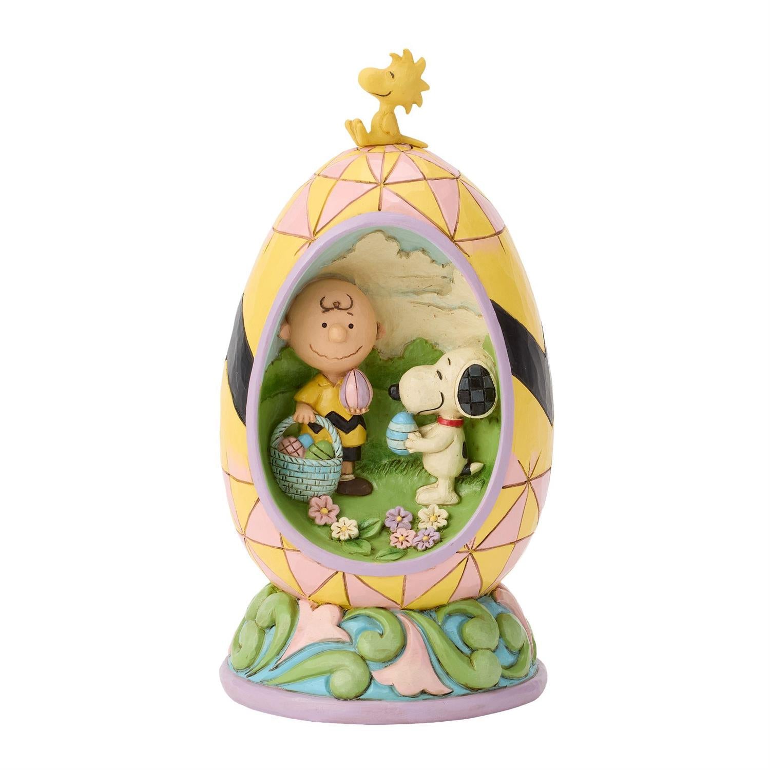 Charlie Brown and Snoopy look for Easter Eggs inside an Easter Egg while Woodstock sits on top
