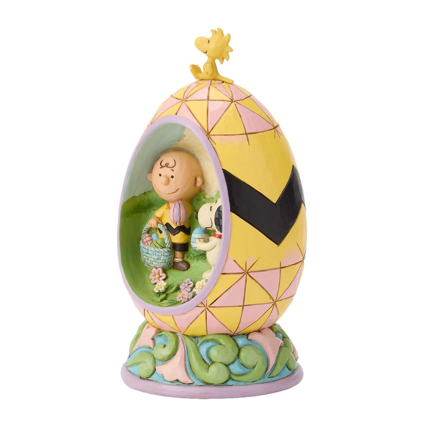 Charlie Brown and Snoopy look for Easter Eggs inside an Easter Egg while Woodstock sits on top