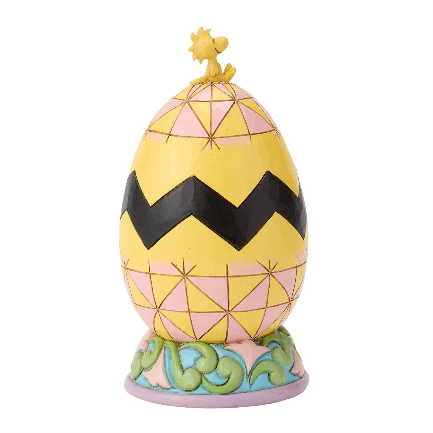 Charlie Brown and Snoopy look for Easter Eggs inside an Easter Egg while Woodstock sits on top
