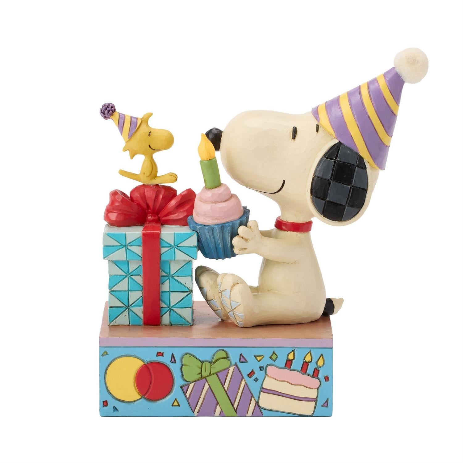 Snoopy and Woodstock wearing Birthday Hats, Snoopy holding a Cupcake with Woodstock watching