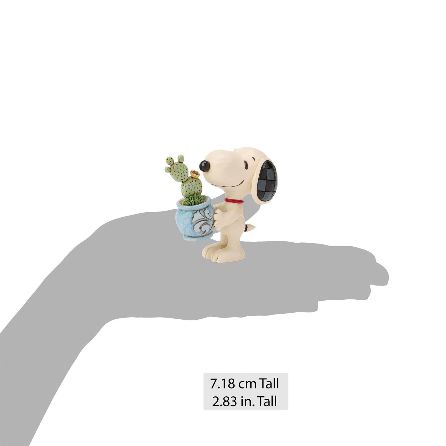 Snoopy holding a Cactus in a Pot 