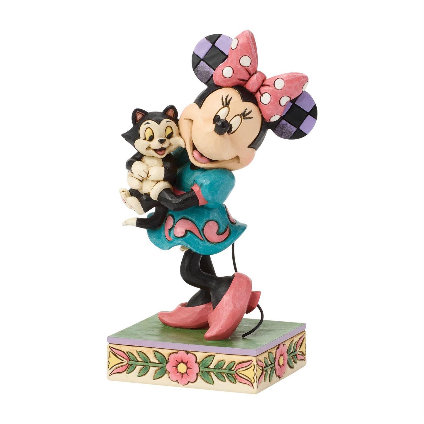 Minnie holding Figaro