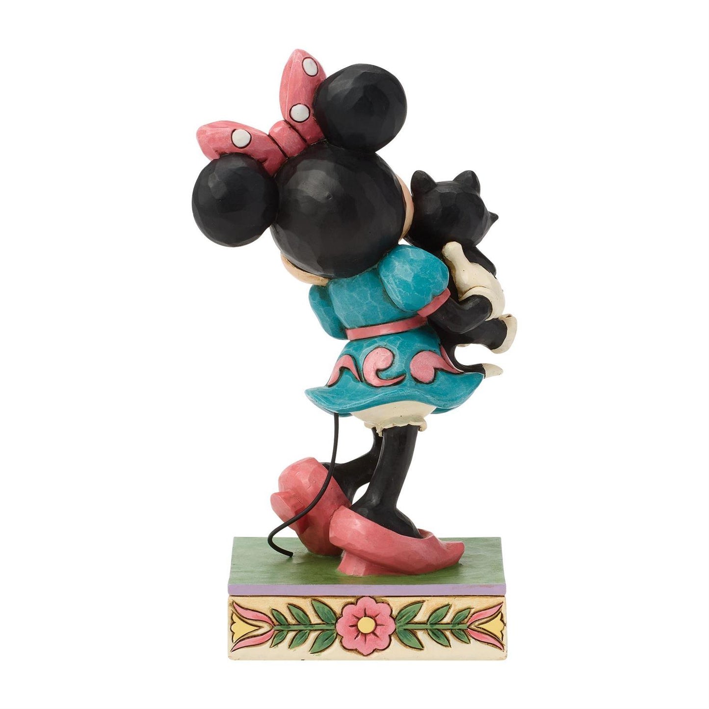 Minnie holding Figaro