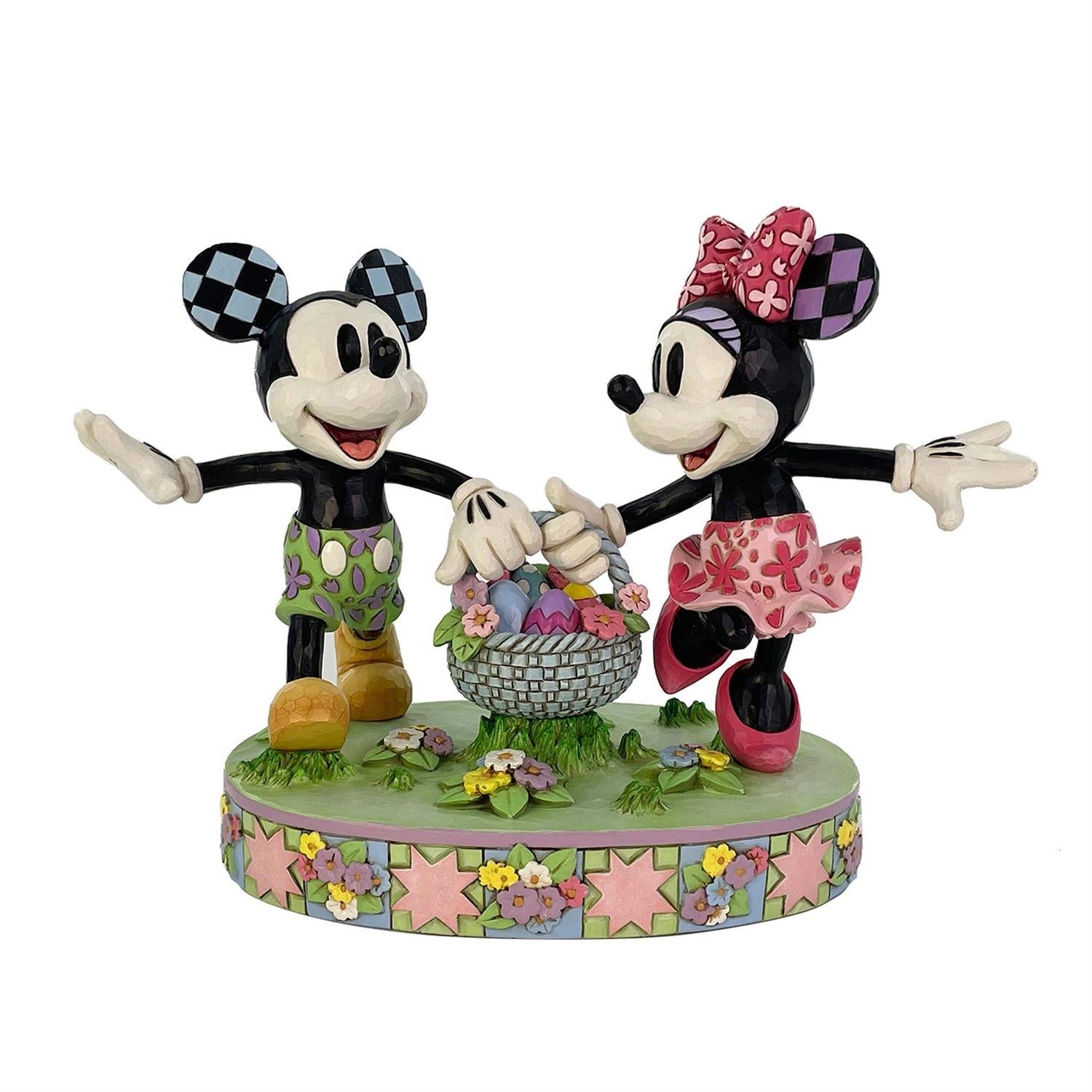 Mickey and Minnie carrying an Easter Basket full of Eggs