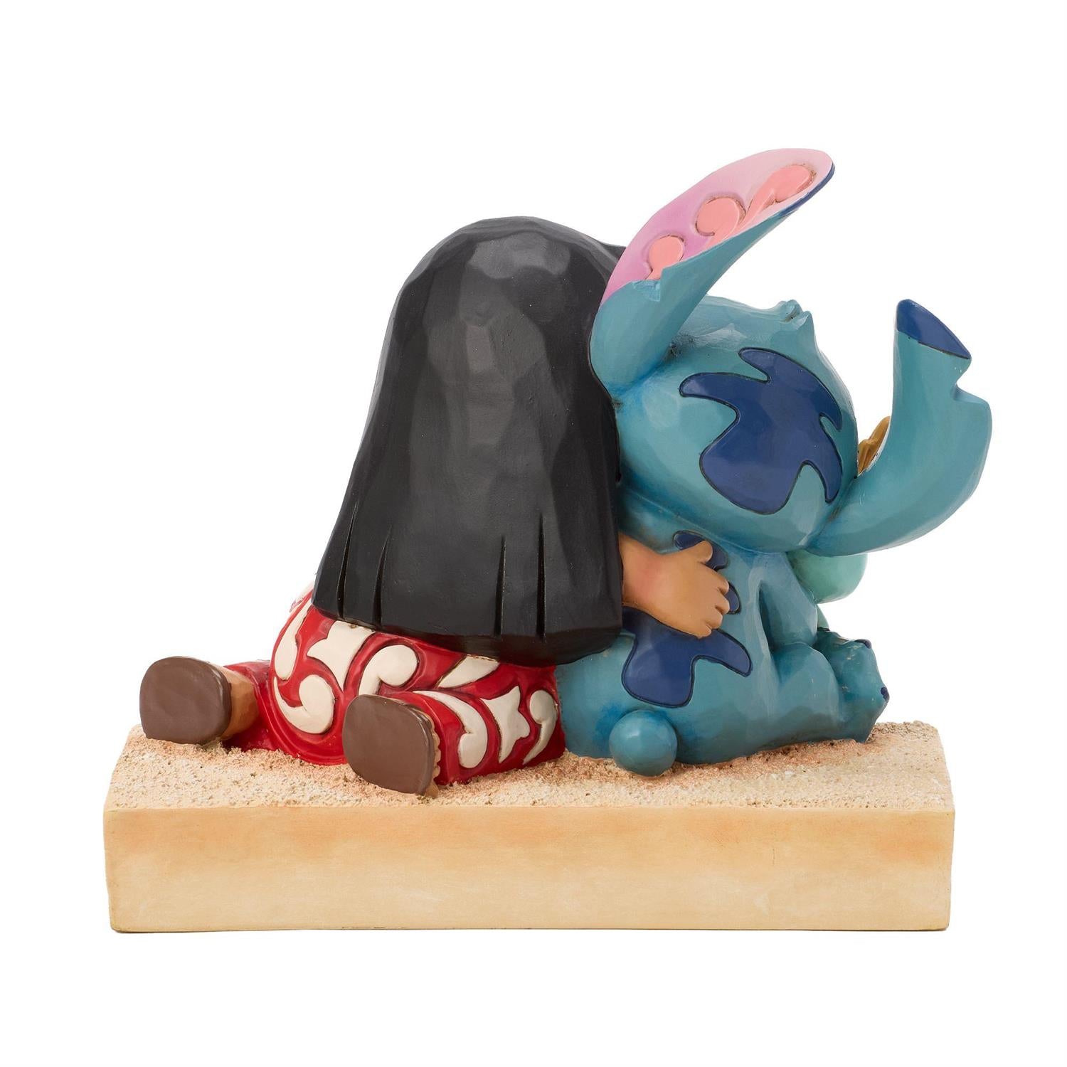 Lilo hugging Stitch while he's hugging Scrump