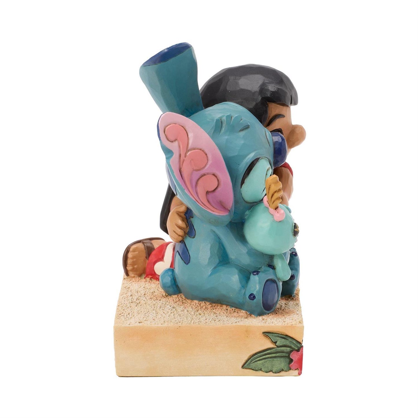 Lilo hugging Stitch while he's hugging Scrump