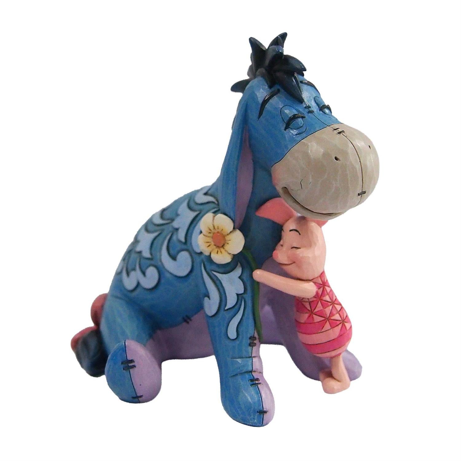 Piglet giving Eeyore a hug