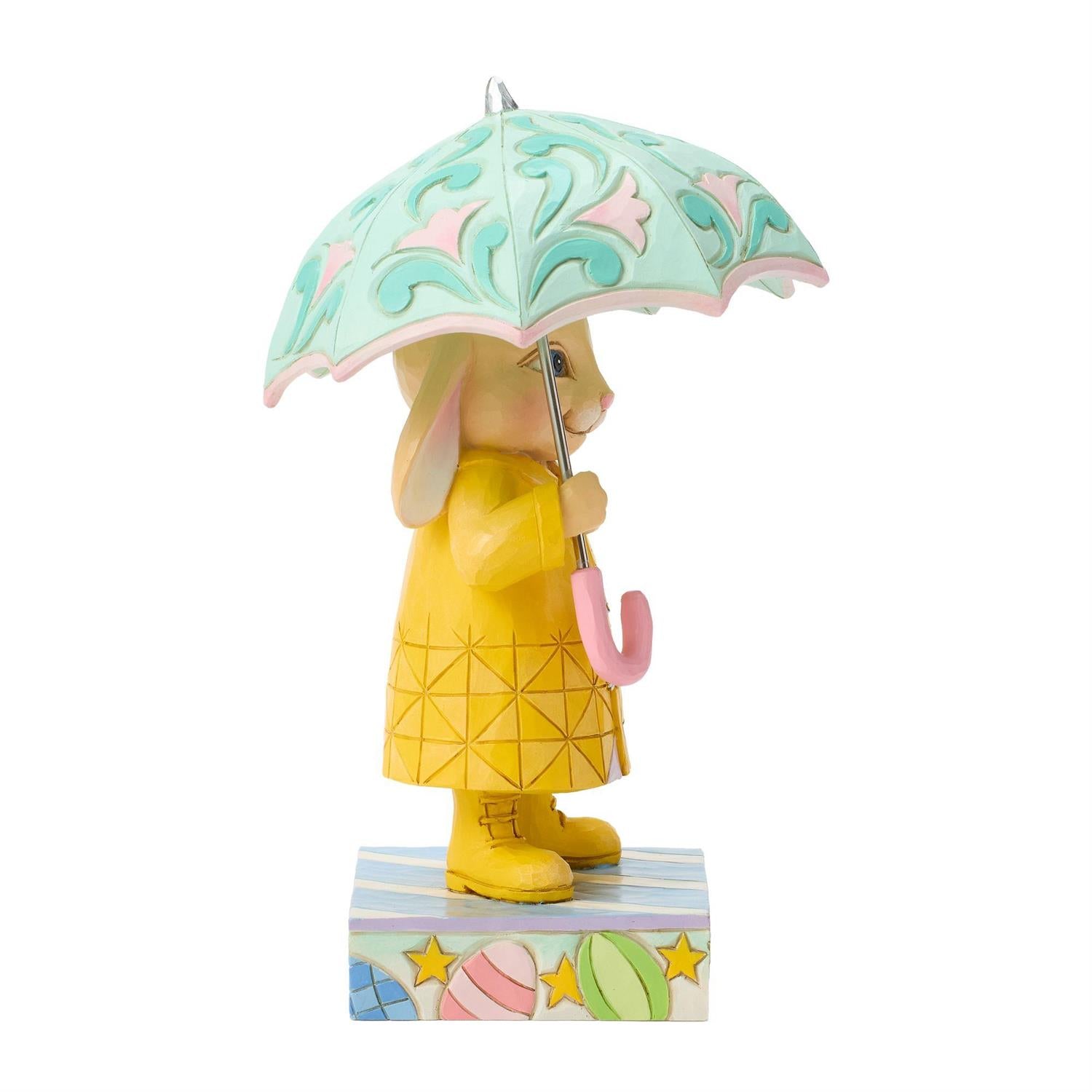 Bunny in Rain Coat and Boots holding an Umbrella