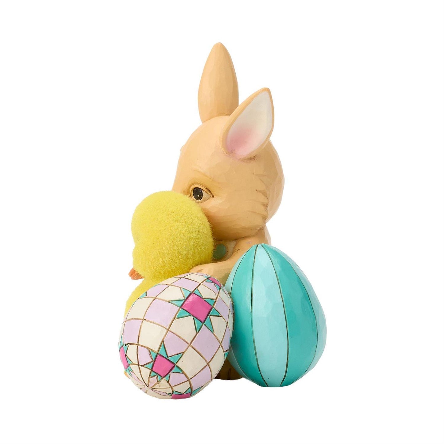 Bunny hugging a Duckling surronded by Easter Eggs