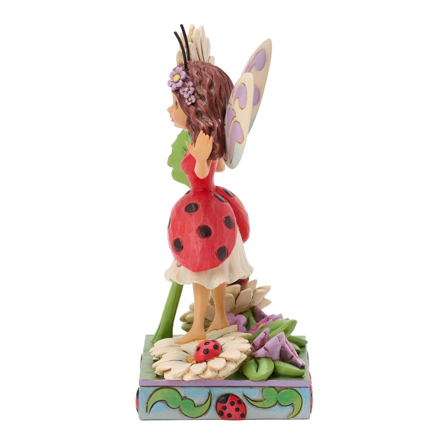 Ladybug Fairy holding a Flower