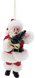 Decorative ornament of a Santa Claus holding a Christmas tree on a white background