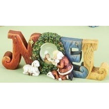 Santa Kneeling By Baby Jesus