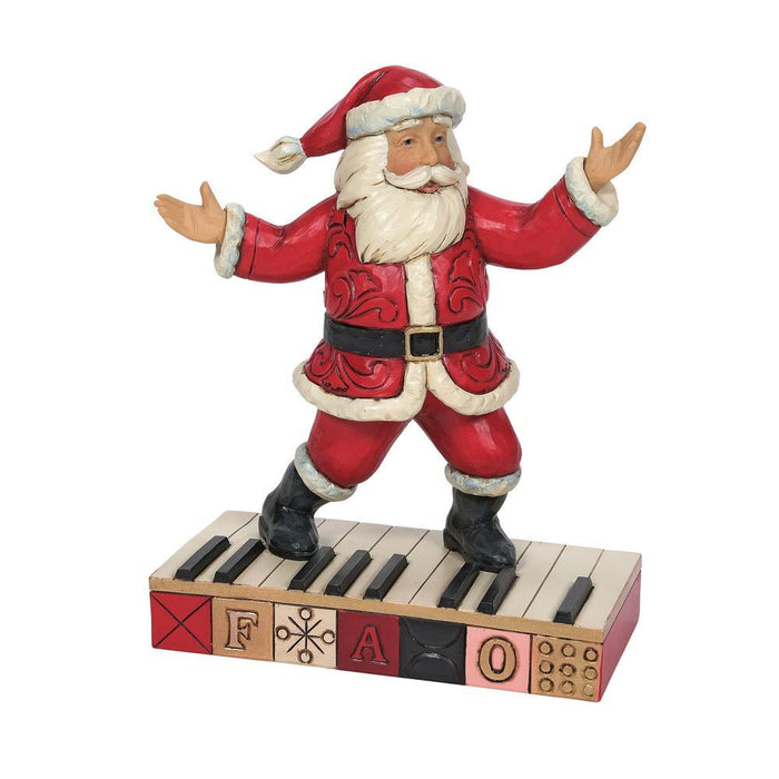 Tapping out a Christmas jingle - Santa on Keyboard